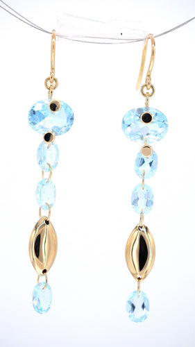 Dangling icy blue topaz
